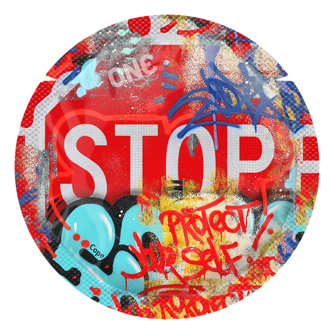Circular object with 'STOP' and 'PROTECT' text, colorful graffiti-style design