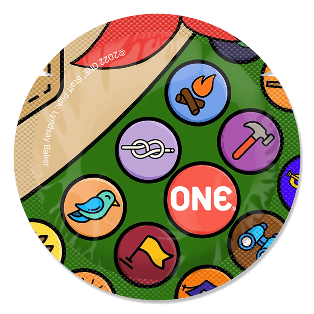 Colorful condom wrapper set with various symbols on a green background